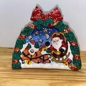 ceramic Santa Claus candle holder.